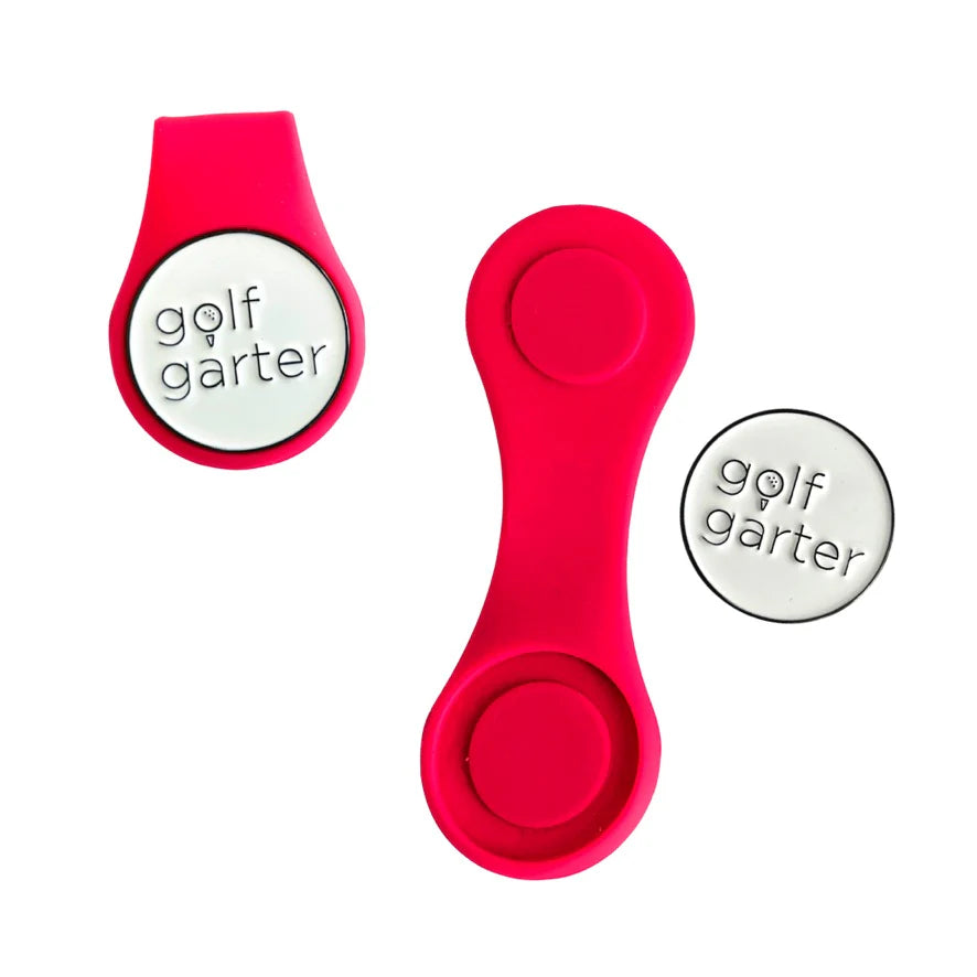 Berry color variant of the fold-over magnetic golf ball marker by Golf Garter.